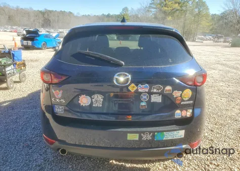 2021 Mazda Cx-5 Touring z USA, uszkodzony, nr VIN JM3KFACM7M1328518